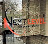Logo of Next Level Restaurant Brands